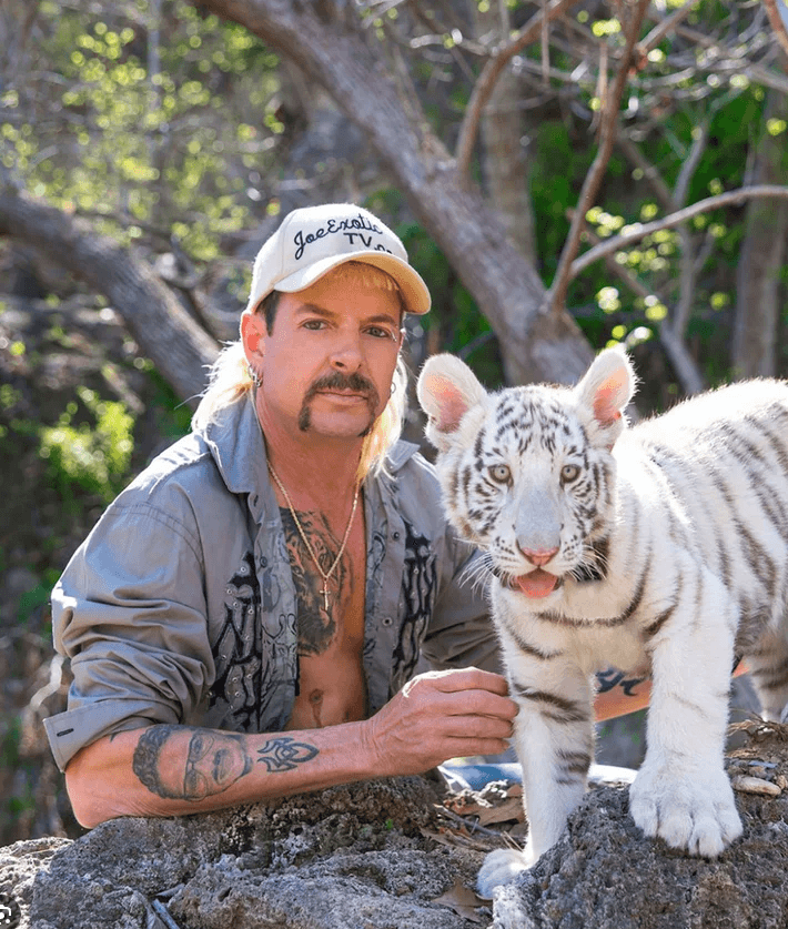 Joe with a white tiger cub